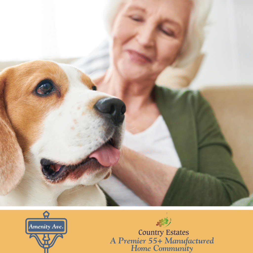 An older woman sits on a couch, smiling and petting a beagle. A banner at the bottom reads, "Country Estates: A Premier 55+ Manufactured Home Community.